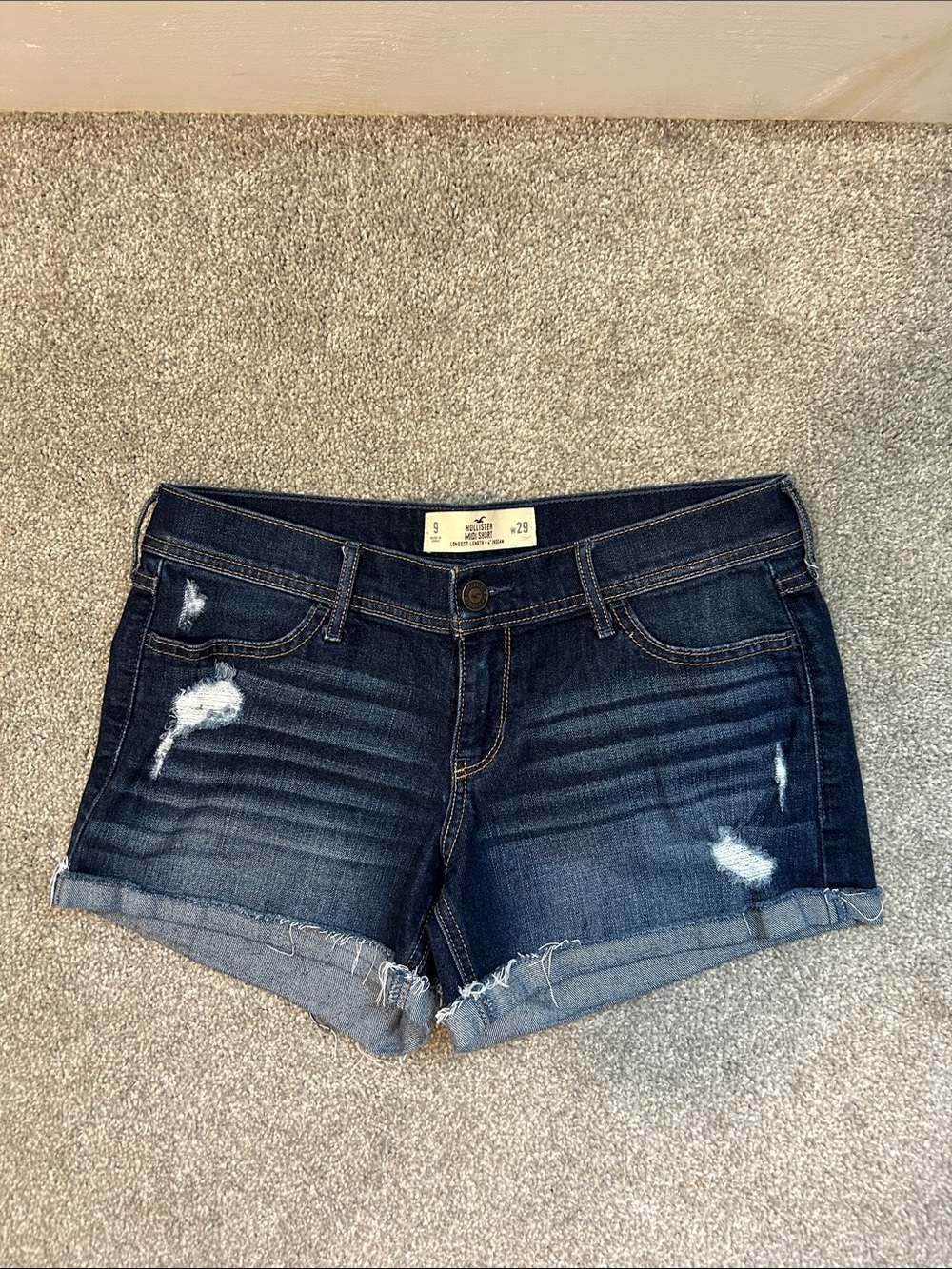 Hollister midi Dark Wash Distressed low rise Jean Shorts